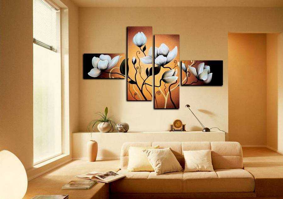 Картины в интерьере гостиной в современном стиле: в рамке на стене, над диваном, три картины в одном стиле

 - 35 фото